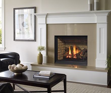 Regency B36XTCE gas fireplace with white mantel and tan surround